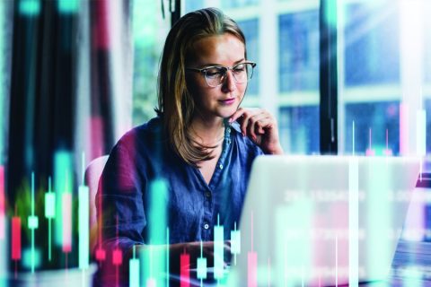 Woman looking at a computer.