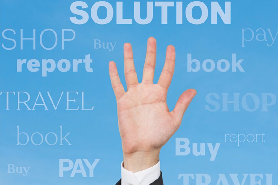 A raised hand in front of a blue background filled with floating words such as "SOLUTION," "SHOP," "REPORT," "TRAVEL," "BOOK," "BUY," and "PAY." The text varies in size and opacity, symbolizing various actions and concepts related to problem-solving and decision-making. The raised hand suggests engagement, choice, or action.