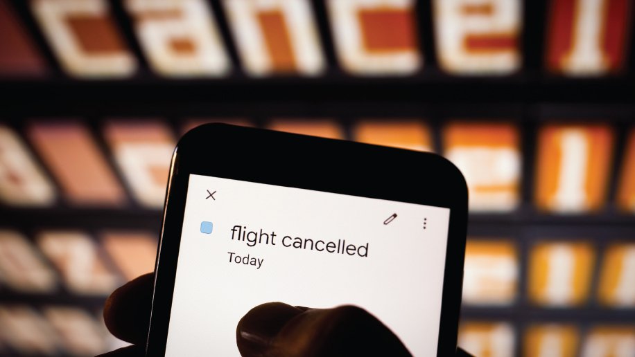 Flight cancelled banner on smartphone.
