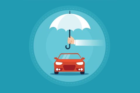 Umbrella held over a red cartoon car.