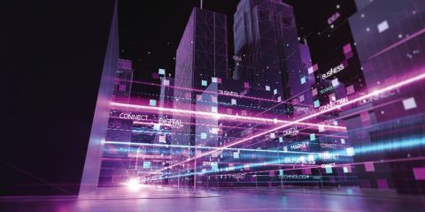 A futuristic digital cityscape with illuminated skyscrapers and interconnected pathways of vibrant pink and blue light. The scene is overlaid with keywords like "CONNECT," "DIGITAL," "BUSINESS," and "TECHNOLOGY," emphasizing themes of innovation, networking, and digital transformation. The perspective and glowing accents highlight the dynamic integration of technology within urban and business environments.