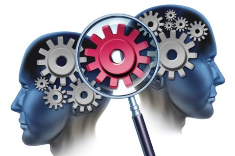 Two robot heads with gears.