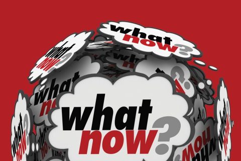 A red background features a cluster of overlapping thought bubbles, each containing the phrase "what now?" in bold black and red letters. The design conveys confusion, uncertainty, or a need for direction, with a dynamic and chaotic visual effect.